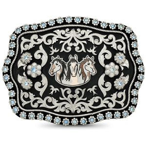 A custom silver belt buckle for women featuring a three horse head figure with silver scrolls and flowers on a hand matted base